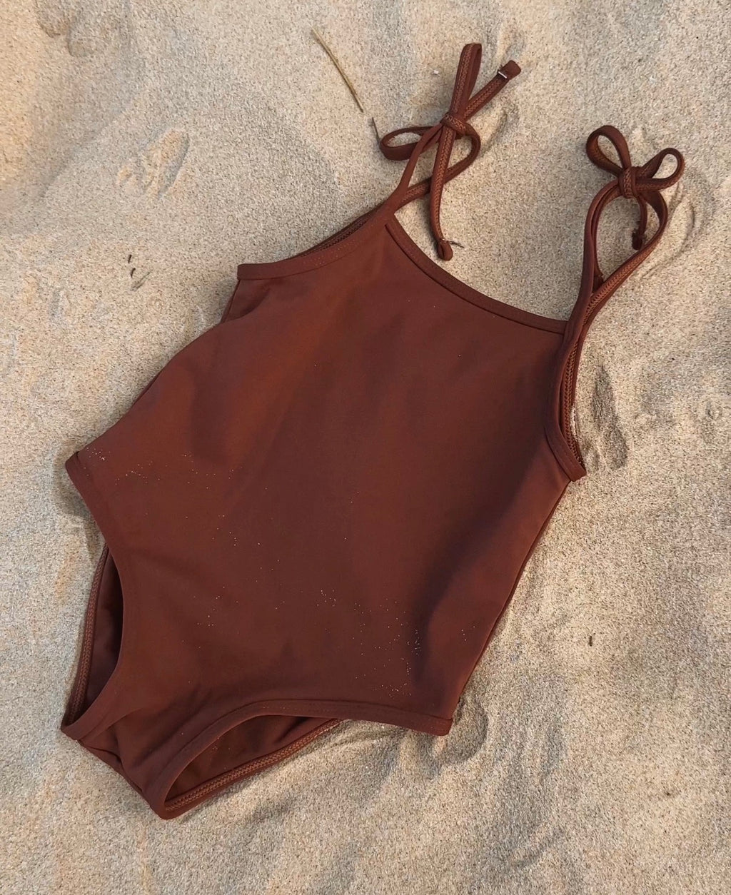 Palm tie-up one piece
